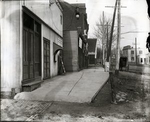 Horizontal, black and white photograph of Dieckman Wagon Manufacturing is at left in the distance at 8301 Halls Ferry